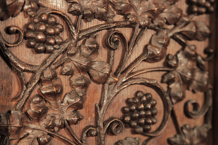 Gebruder Knake carved front panel detail of an arabesque vine