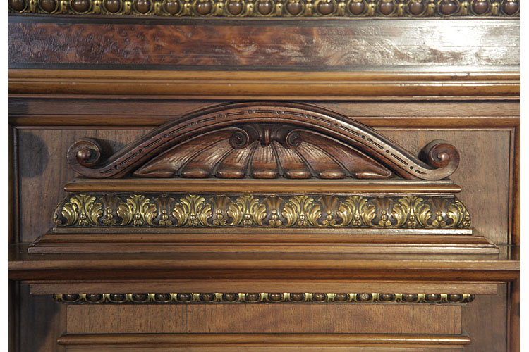 German piano ornate carving and gilt accent detail