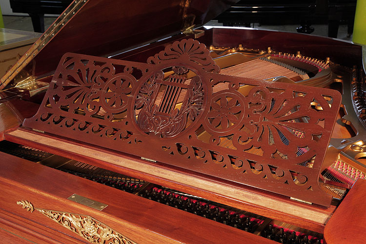 Ibach grand piano music desk carved with a central lyre and laurel leaves