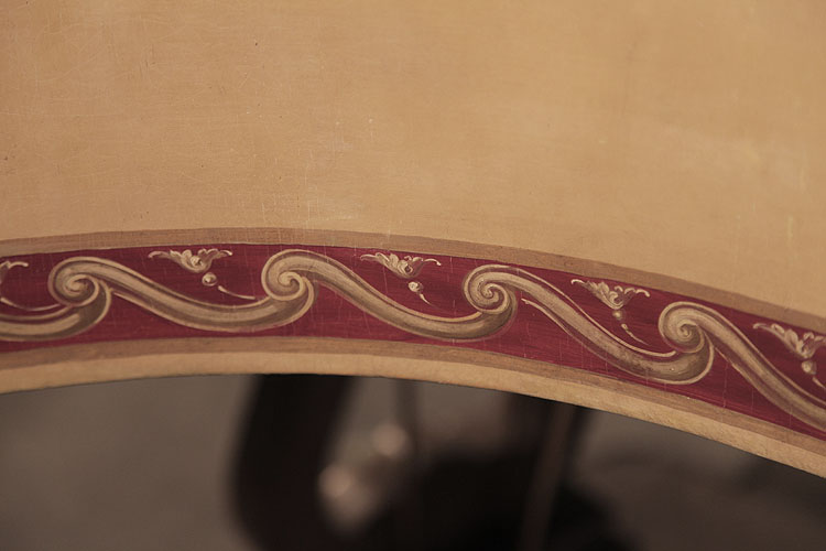 Hand-painted S-curves border the entire cabinet