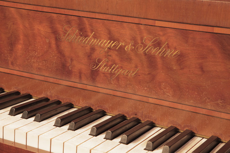 Schiedmayer manufacturers name inlaid in brass on fall with a dual border of boxwood stringing