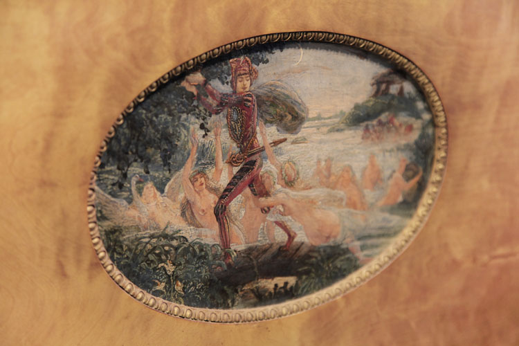 Hand-painted oval by Danish artist Gudmund Hentze featuring a man fleeing a river of nymphs 