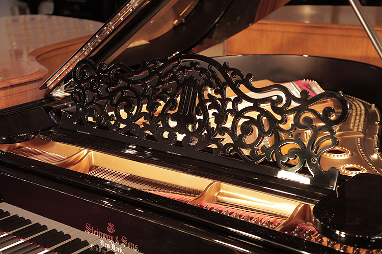 Steinway filigree  piano music desk in an arabesque design with central lyre motif