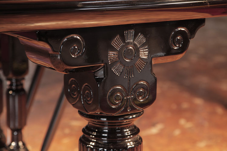 Steinway piano leg pediment carved with a stylised flower and scrolls