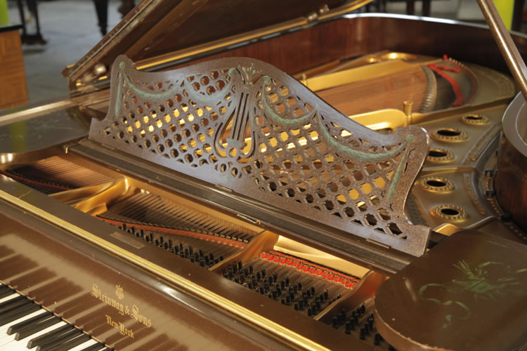Steinway Model B music desk in a cut-out latticework design with a central lyre motif and hand-painted swags