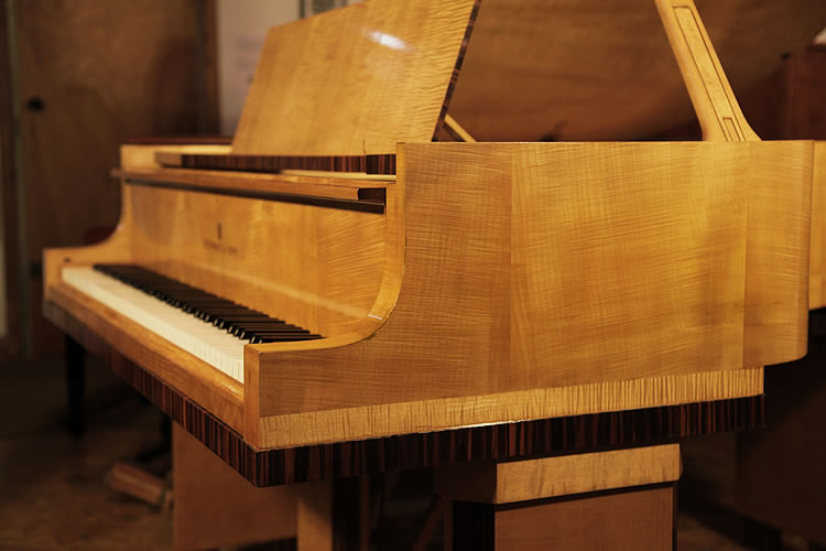 Steinway model M piano cheek detail with geometric styling