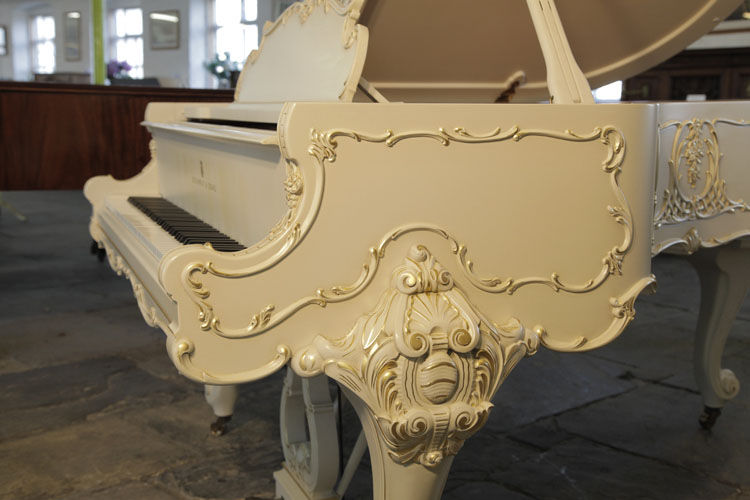 Steinway  curved pianos cheek with  asymmetrical, acanthus mouldings   with gilt accents
