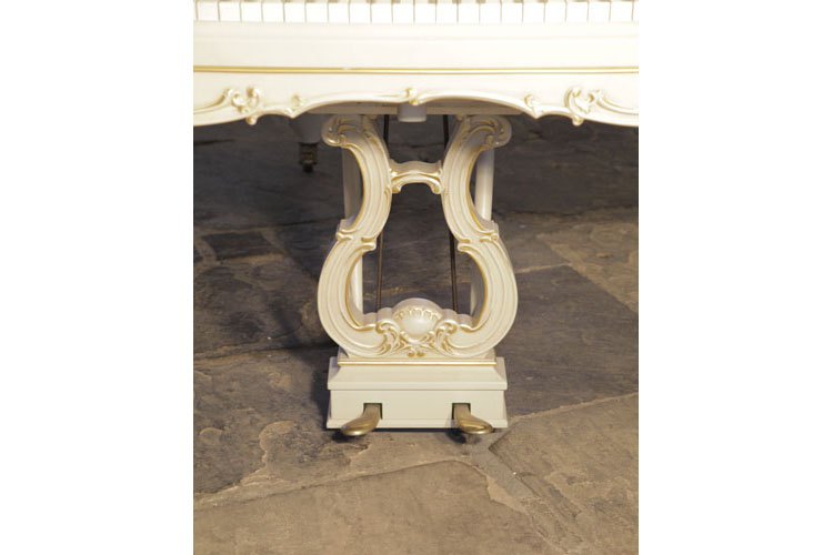 Steinway   two-pedal piano lyre in a mirrored S-curve design with central stylised rocaille and gilt accents