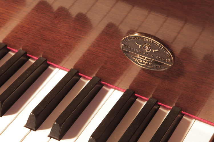 Steinway Crown Jewel Collection badge on fall