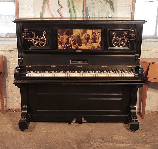 Golden age of pianos. A 1905, Brinsmead upright piano with a  central panel featuring a crystoleum  of a Classical scene