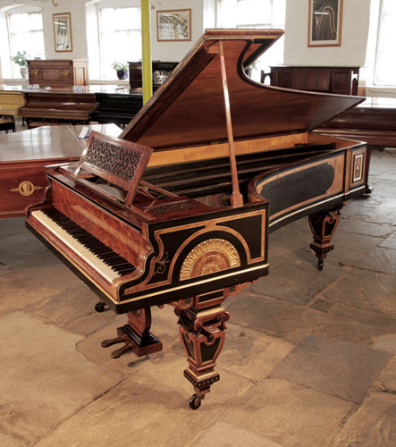Golden Age of Pianos. An 1861, Erard  grand piano with a cabinet featuring Egyptian Revival and Neoclassical elements by cabinet maker, William Lomax.