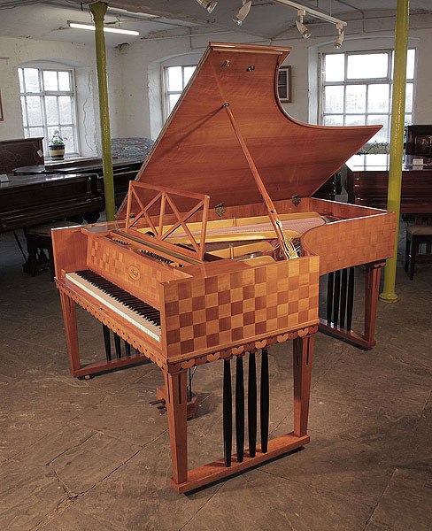 Restored, 1907, Ibach model 2 grand piano for sale with a chequered, cherry case, openwork music desk and gate legs with black spindles. Designed by Emanuel von Seidl. Piano one of two designed for and offered to Richard Strauss. 