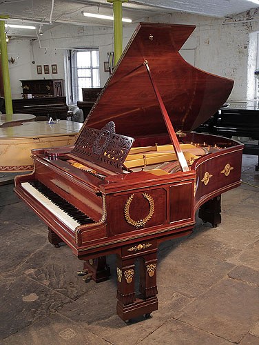 Golden Age of Pianos. Empire style, 1901, Ibach model 2 grand piano for sale with a mahogany case and gate legs. Entire cabinet decorated with ormolu mounts depicting scenes of greek gods, goddesses and wreaths