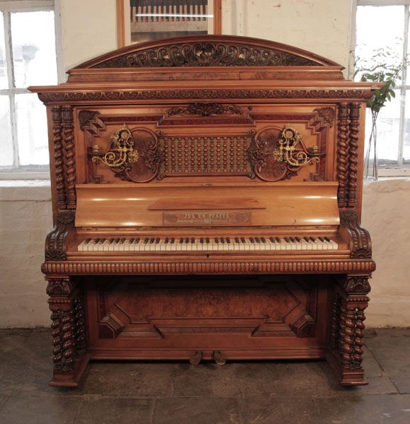 German Late Renaissance style, 1896, Pfaffe upright piano for sale with a walnut case, mock roll top piano fall and barley twist legs