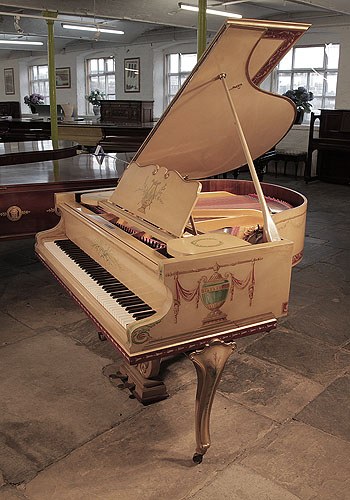 Golden Age of Pianos. Beuloff grand piano for sale with a cream case with cabriole legs. Entire cabinet hand-painted in Empire style motifs including wreaths, vases, winged putti, lyres, rinceaux, swags and flowers