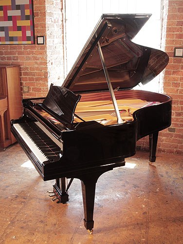 The Golden Age of Pianos. Rebuilt, 1928, Steinway Model A grand piano for sale with a black case and spade legs