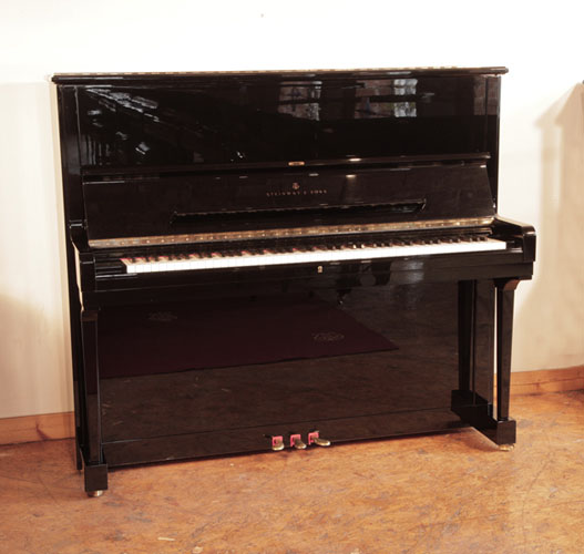 Golden Age of Pianos. Reconditioned, 1990, Steinway Model K upright piano for sale with a black case and brass fittings