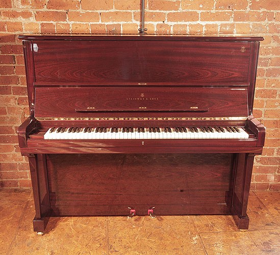 The Golden Age of Pianos. Reconditioned, 2007, Steinway Model K upright piano for sale with a mahogany case and brass fittings