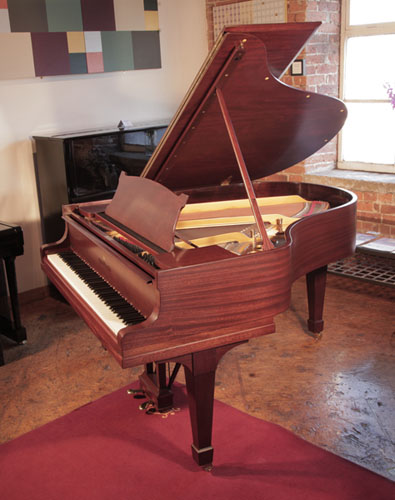 Rebuilt, 1929, Steinway Model M grand piano for sale with a satin, mahogany case and matching stool. 