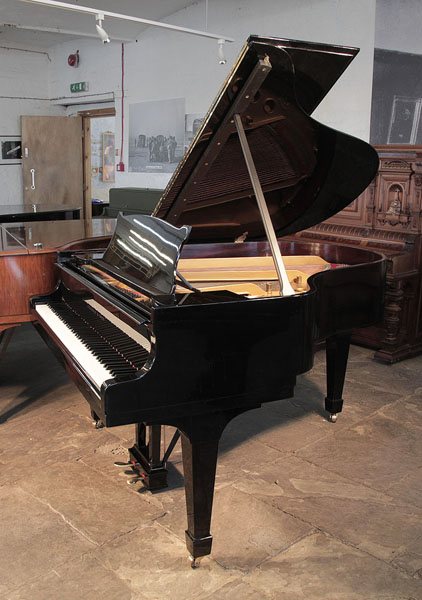 Restored, 1936, Steinway Model M grand piano for sale with a black case and spade legs