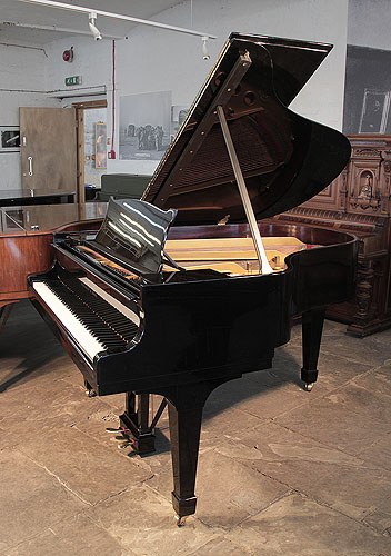 Golden Age of Pianos. Restored, 1936, Steinway Model M grand piano for sale with a black case and spade legs
