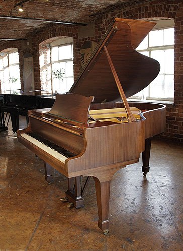 Golden Age of Pianos. Restored, 1961, Steinway Model M grand piano with a satin, walnut case and spade legs