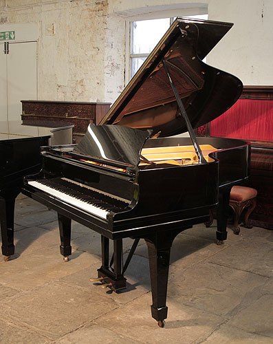 Golden Age of Pianos. A 1926, Steinway Model O grand piano with a black case and spade legs