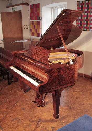 Golden Age of Pianos. Rebuilt, 1935, Steinway Model S baby grand piano for sale with a polished, figured walnut case and spade legs