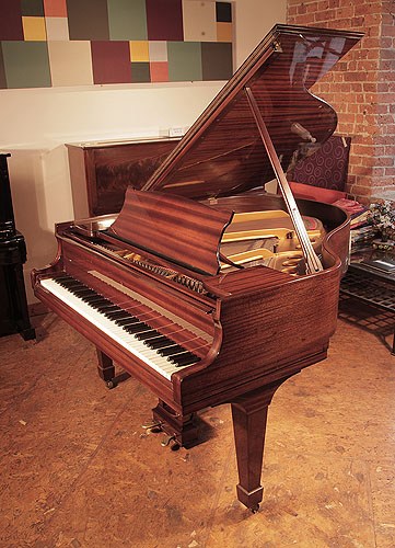 Golden Age of Pianos. Reconditioned, 1966, Steinway Model S baby grand piano with a mahogany case and spade legs