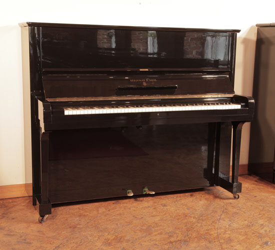 The Golden Age of Pianos. Reconditioned, 1939, Steinway Model V upright piano for sale with a black case and brass fittings