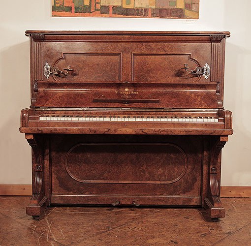 Golden age of pianos. Antique, 1884, Steinway upright piano for sale with a burr walnut case and brass candlesticks 