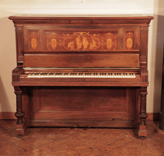 Golden Age of Pianos. Reconditioned, 1894, Steinway upright piano for sale with a polished, rosewood case and panels inlaid in with dancing ladies and putti. 