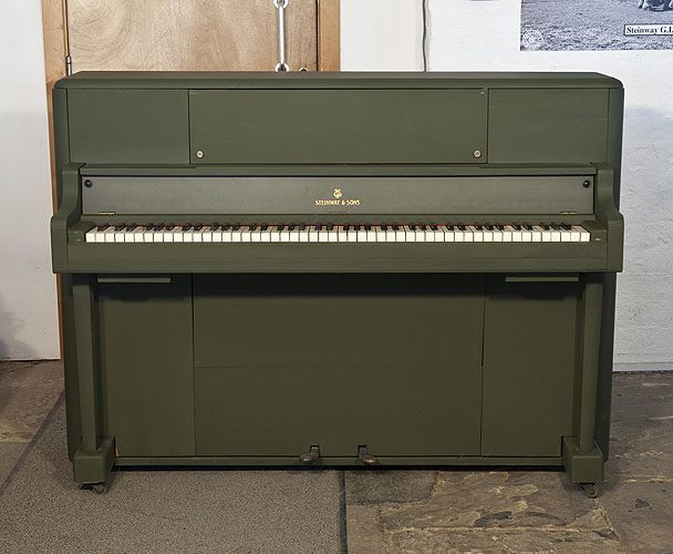The Golden Age of Pianos. A  1945, Steinway 'Victory Vertical' G.I. upright piano for sale with an olive drab case. This upright was airdropped onto battlefields during WWII for the American troops