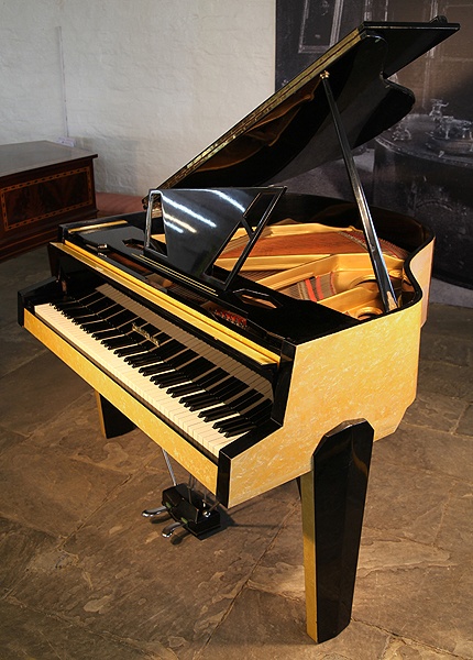 A 1950's Zimmermann baby grand piano  with a 